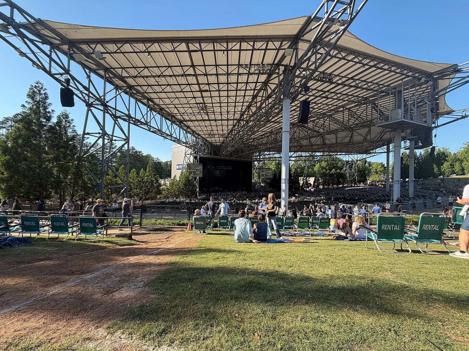 The lawn, covered seating, and stage at Ameris Bank Amphitheatre.
