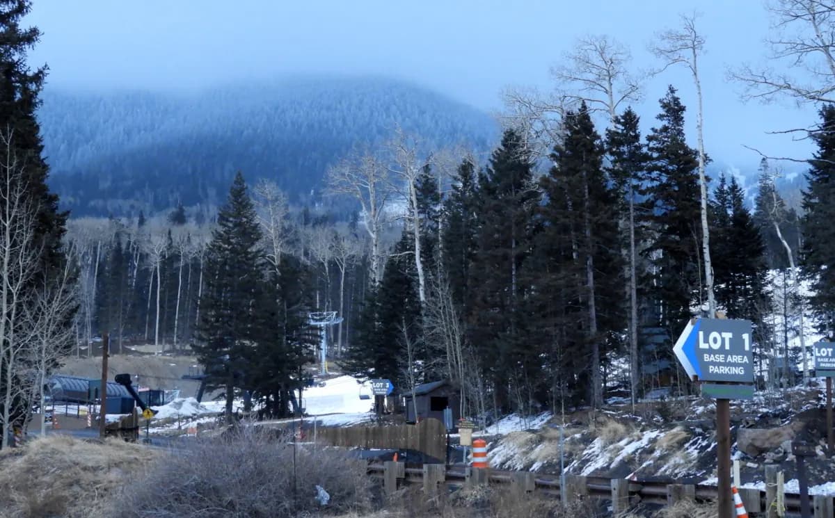 Wide winter view across the ski runs and forest at Arizona Snowbowl