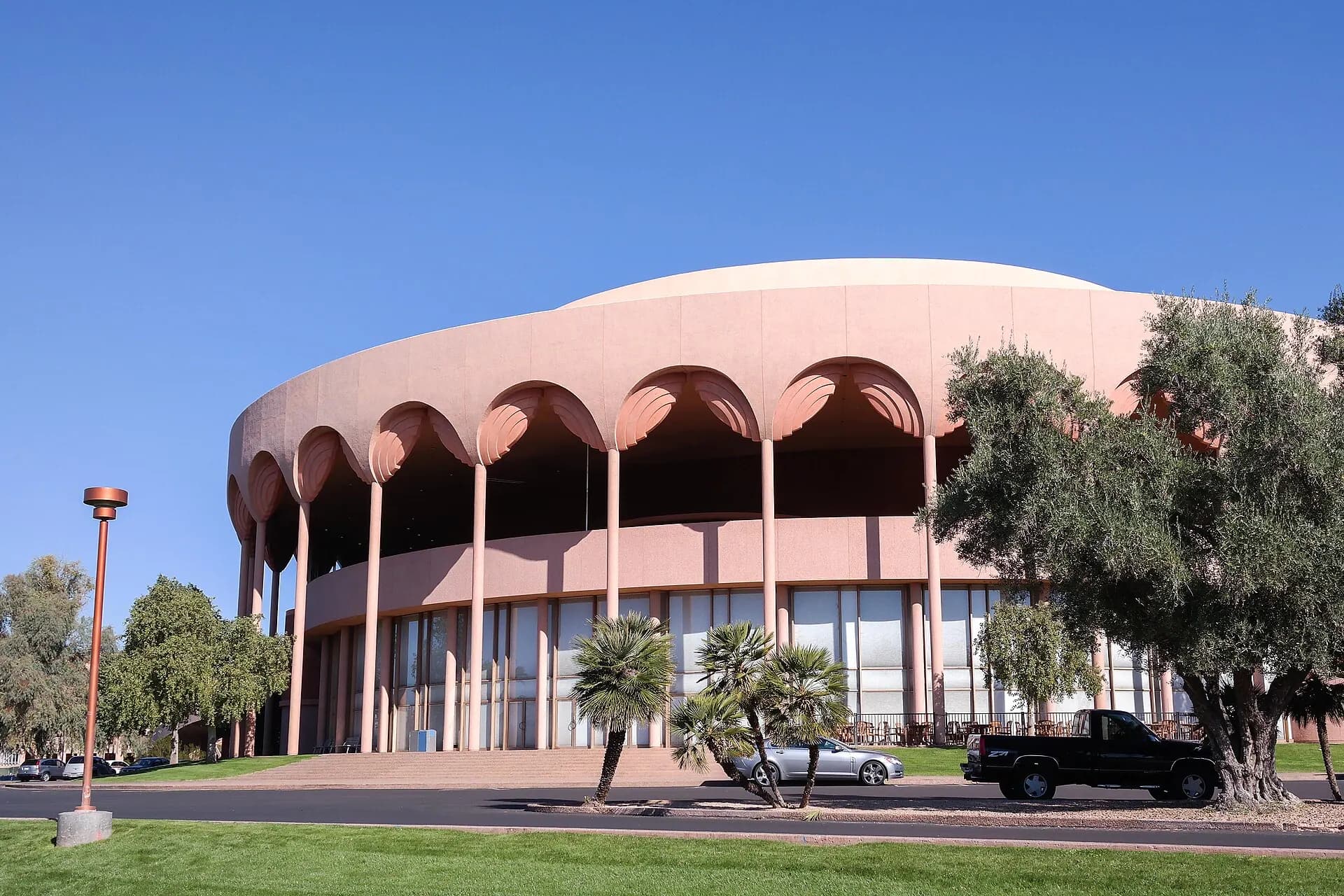 A broad exterior view of ASU Gammage and its curving facade in Tempe.