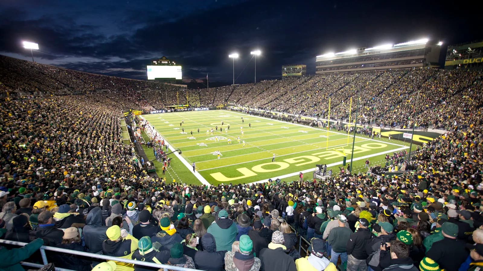 Autzen Stadium illuminated for an Oregon Ducks night game.