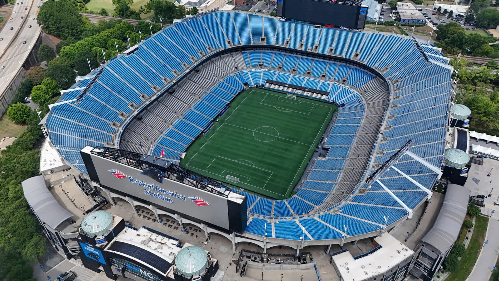 Aerial view into Bank of America Stadium showing the full seating bowl and soccer field in Charlotte.