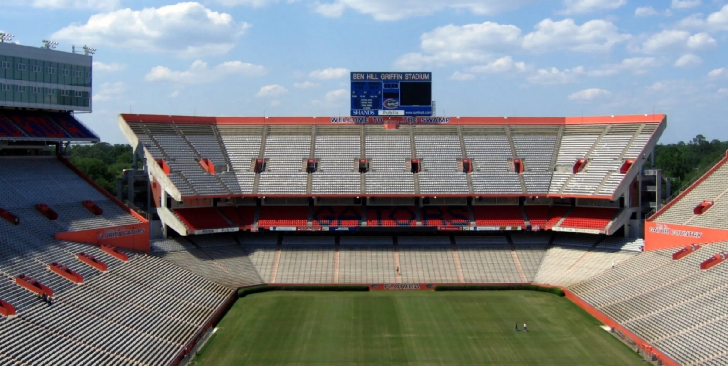 Empty Ben Hill Griffin Stadium field and seating viewed from inside the bowl.