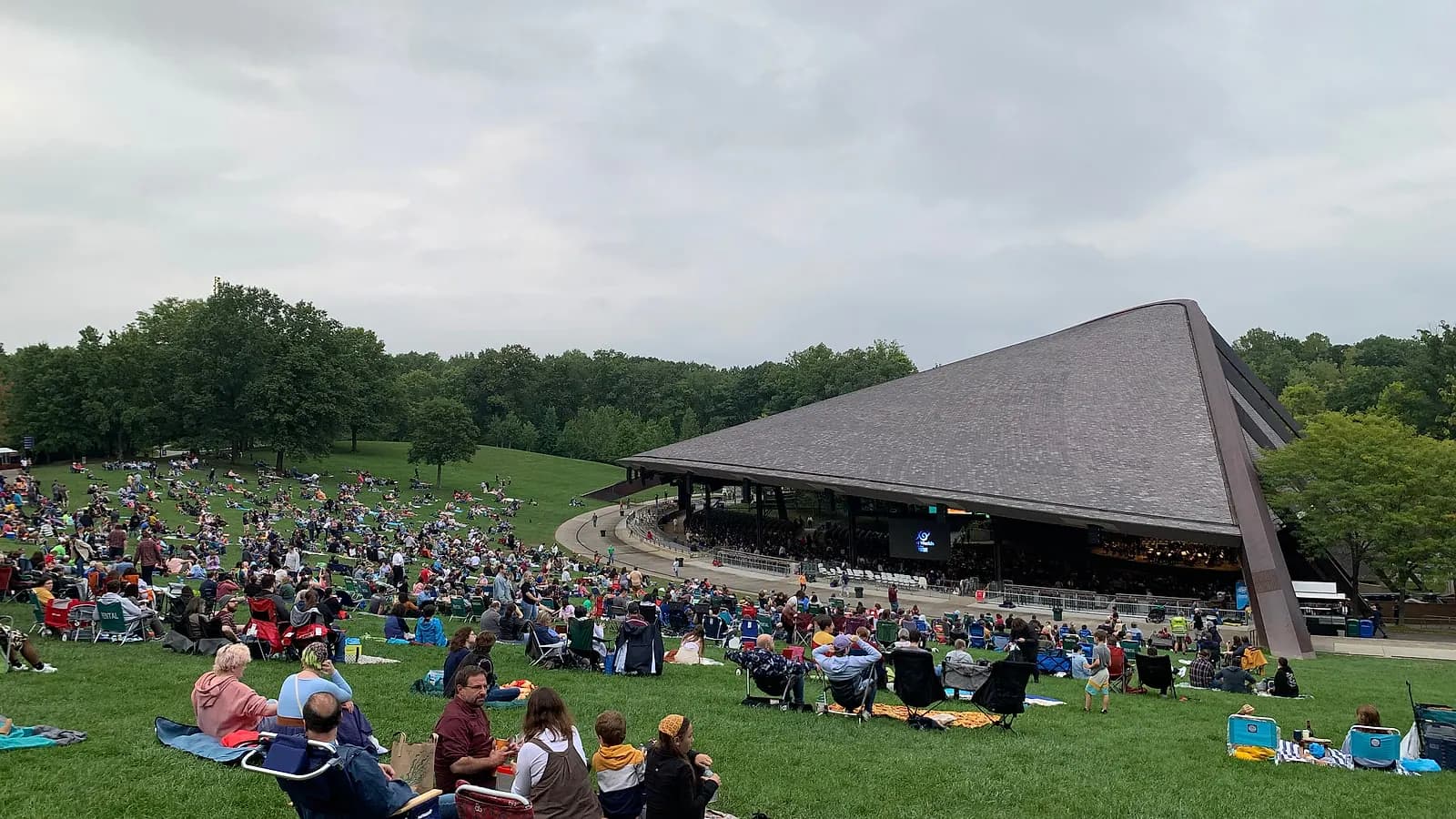 Wide daytime view across the lawn toward the Blossom Music Center pavilion.