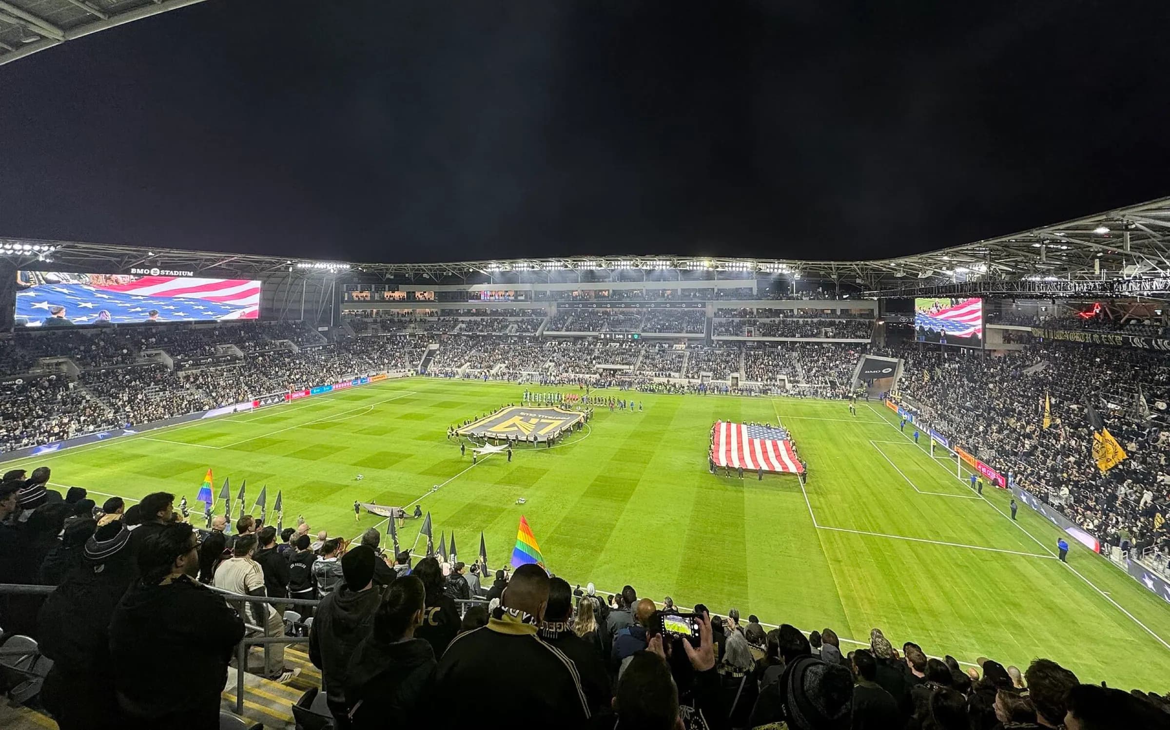 Wide match-day view across BMO Stadium's pitch and packed seating bowl.