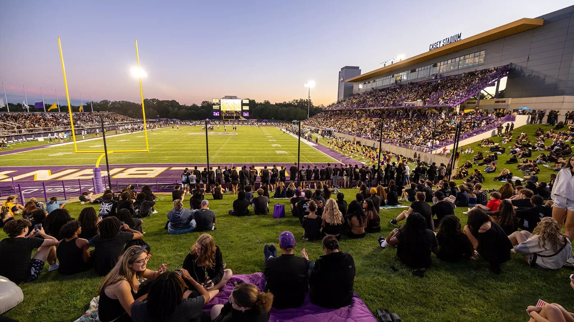 Casey Stadium’s lawn seating and main grandstand during the 2026 football home opener, as identified by UAlbany Athletics.