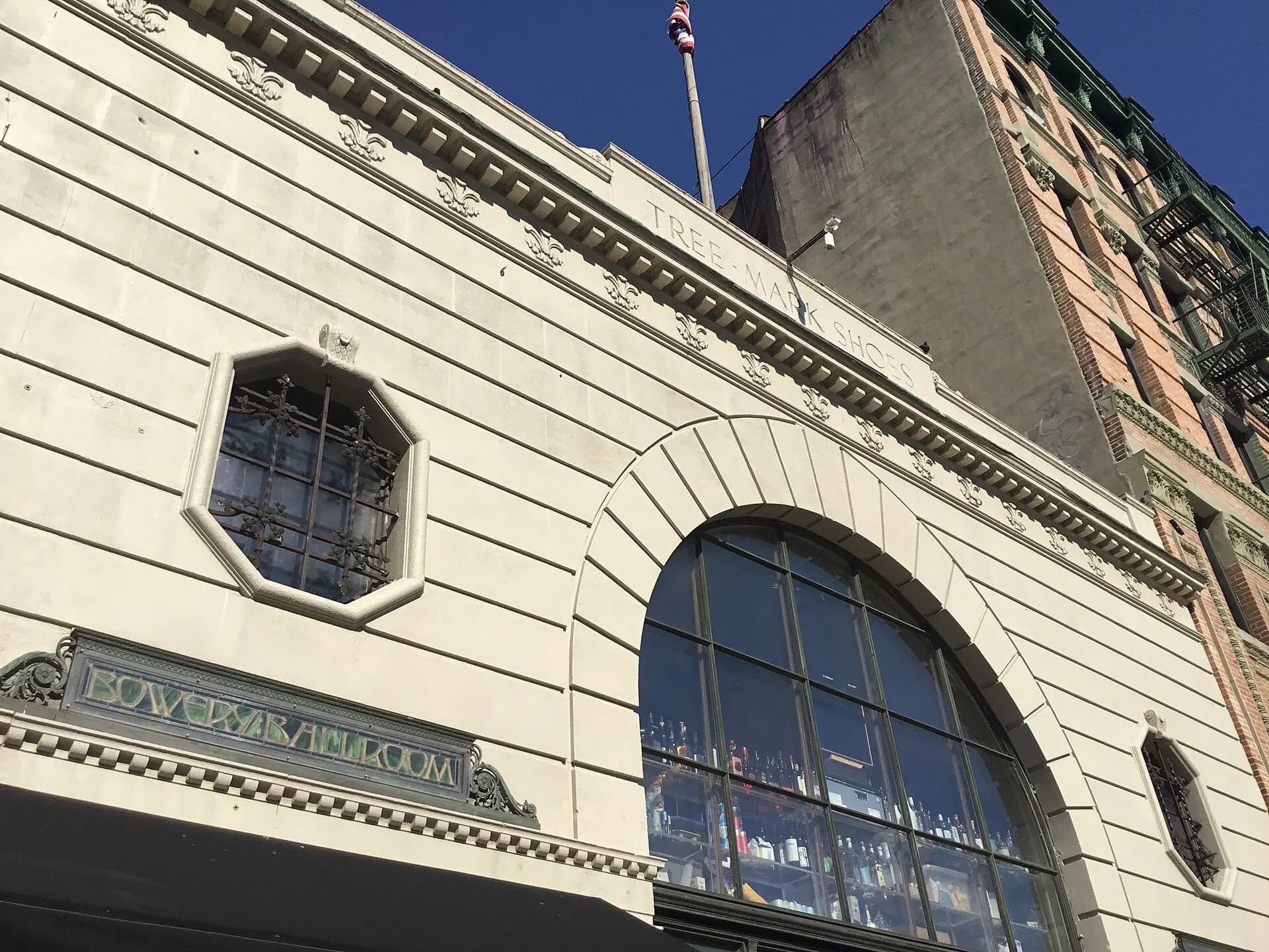 Exterior view of the Bowery Ballroom building and its street-level entrance.