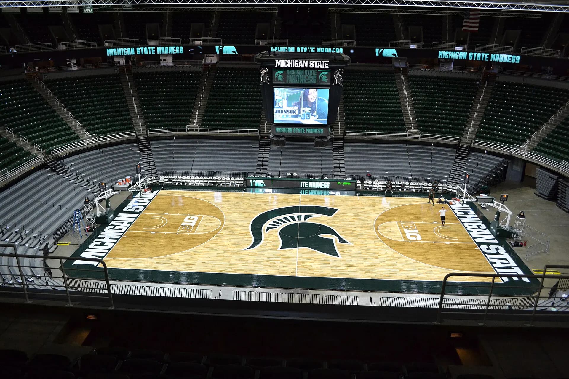 Wide interior view of the basketball court and seating bowl at the Breslin Center.