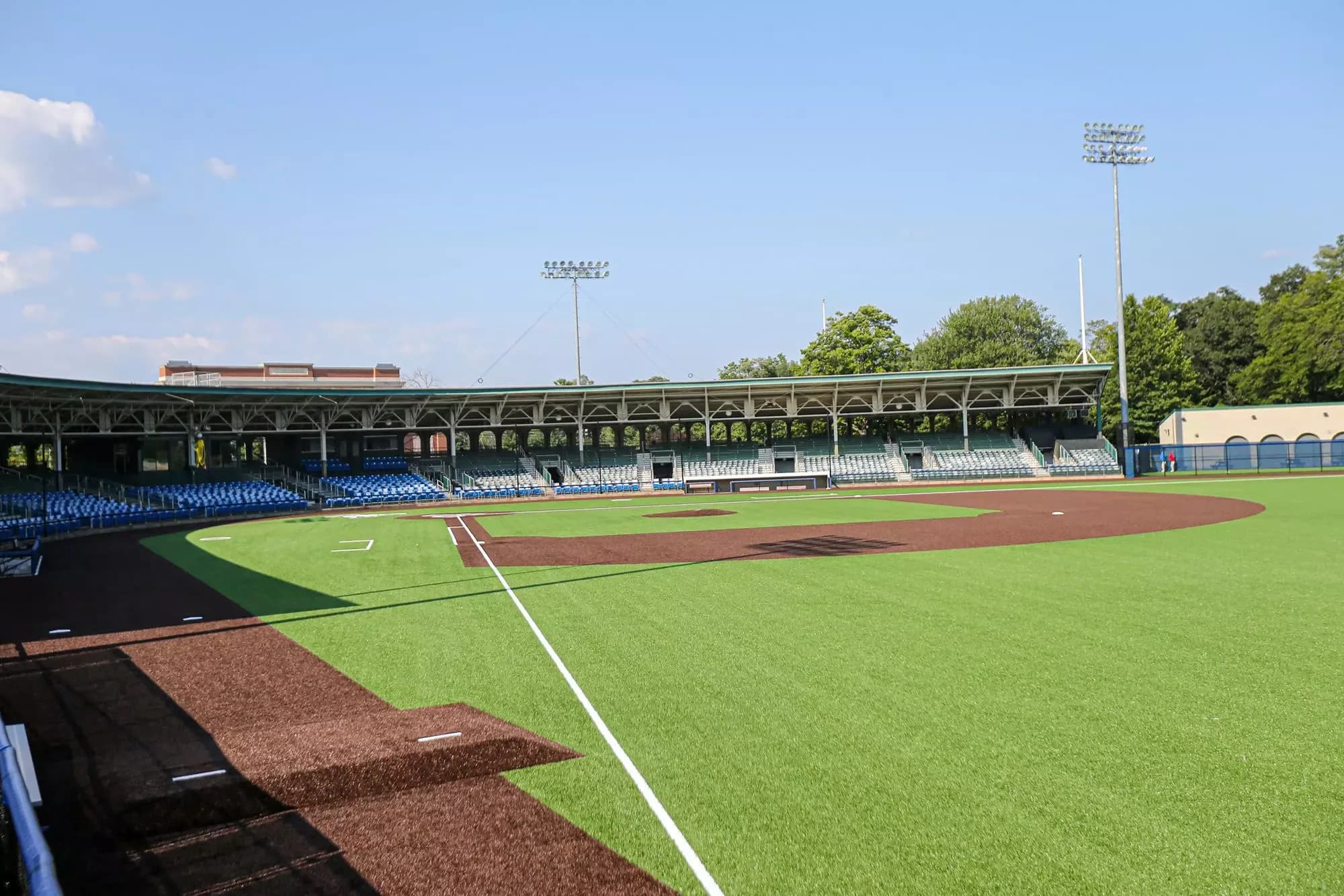 Bush Field’s diamond and covered seating bowl from an elevated position in Yale Athletics’ official collection. This earlier-season view shows the actual baseball venue, with protective fencing and railings intact; the source supplies no exact capture date or individual camera seat.