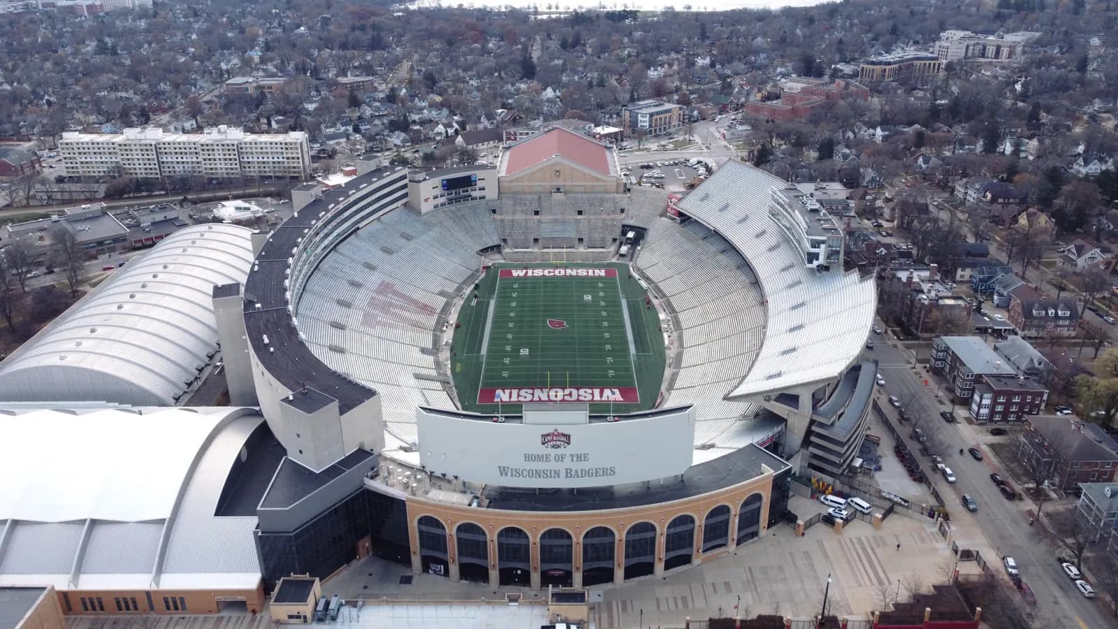 Wide aerial view of Camp Randall Stadium and the Madison campus neighborhood.