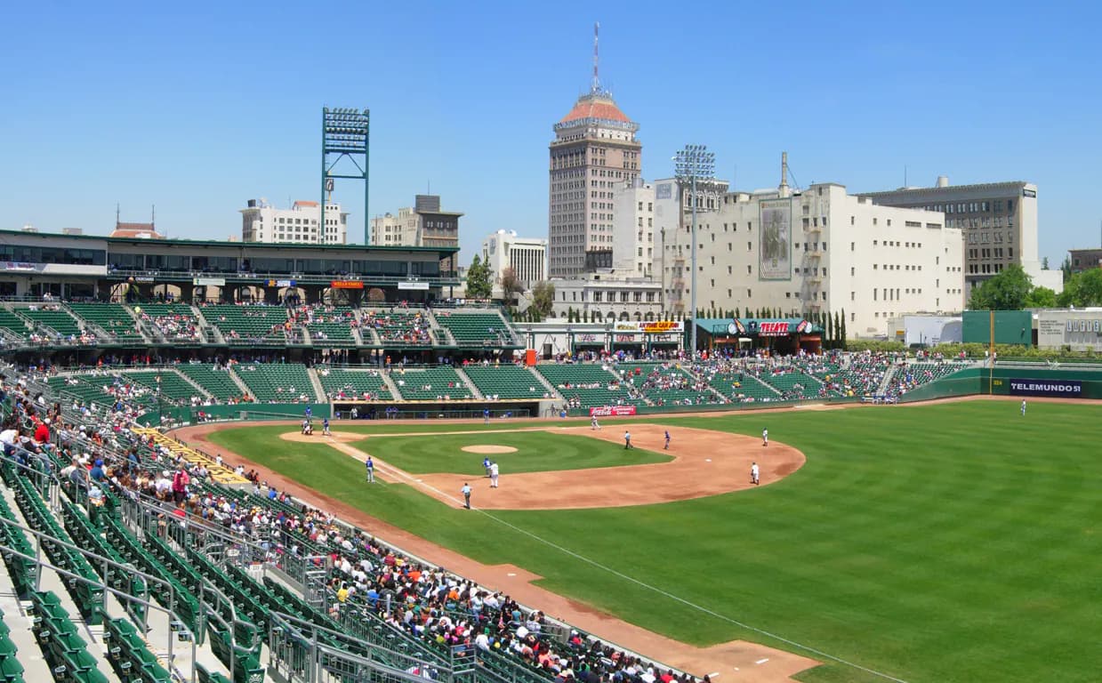 Wide interior view of the field and downtown backdrop at Chukchansi Park