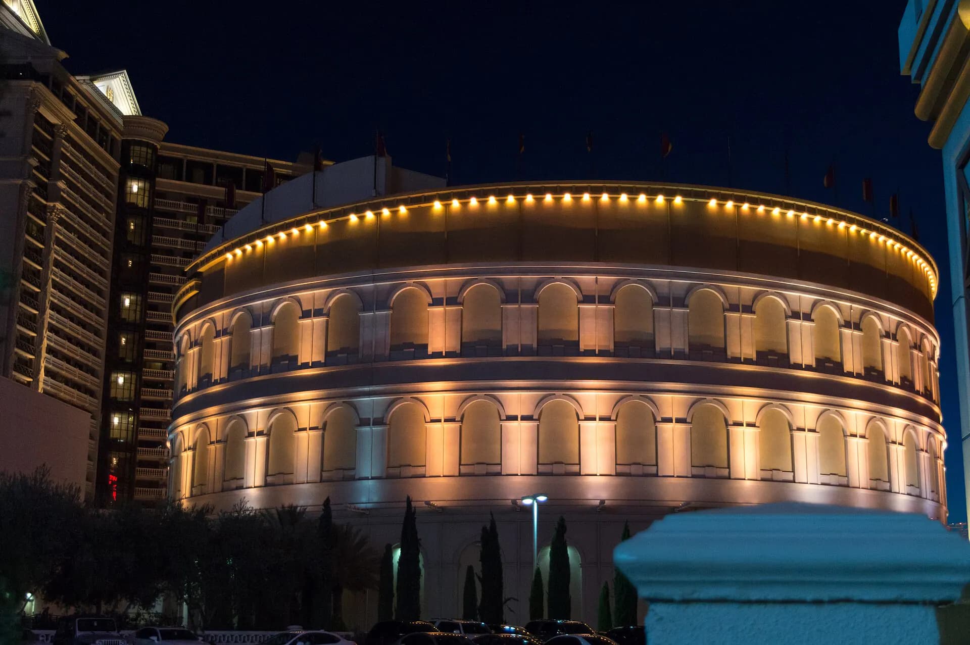 Illuminated exterior arches of The Colosseum at Caesars Palace.