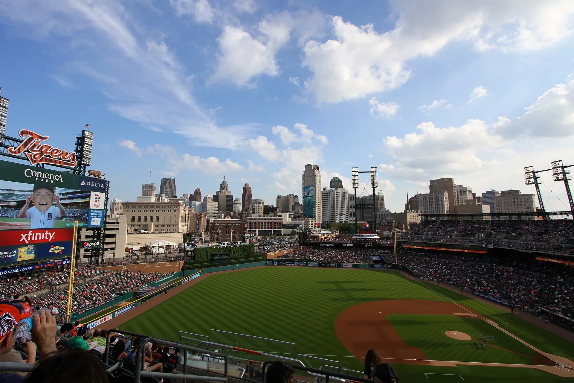 Wide view across Comerica Park toward the Detroit skyline.