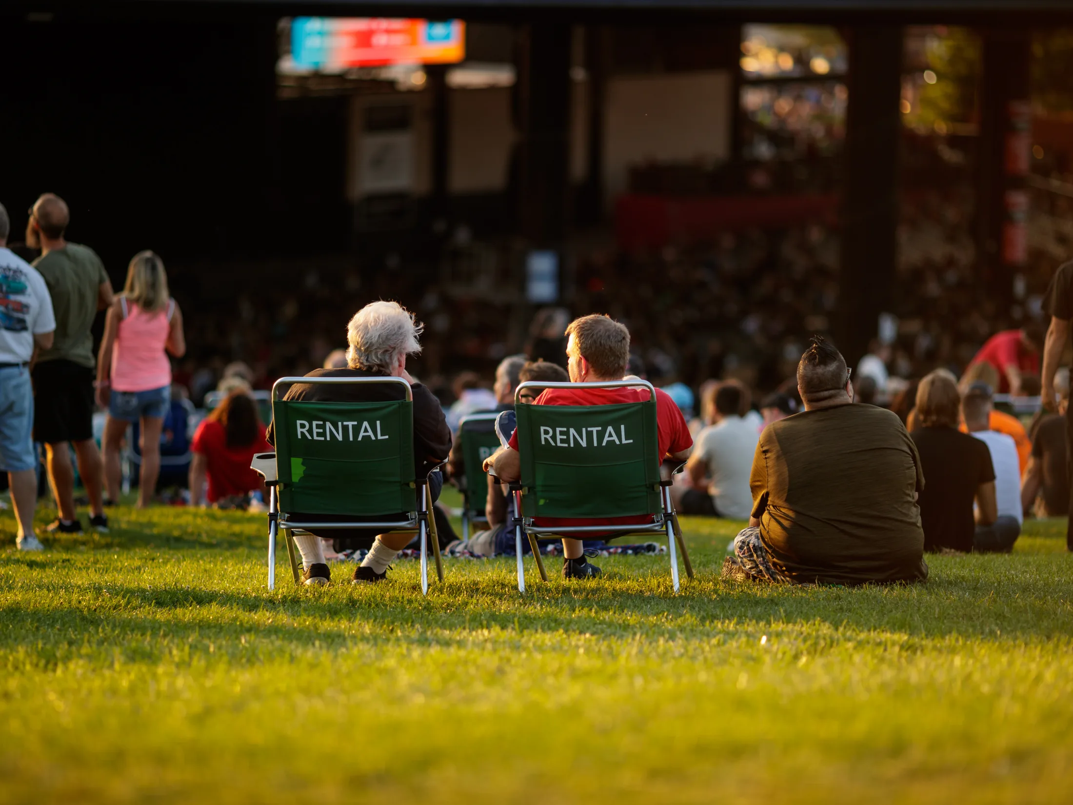 Fans using lawn chairs at Credit Union 1 Amphitheatre.