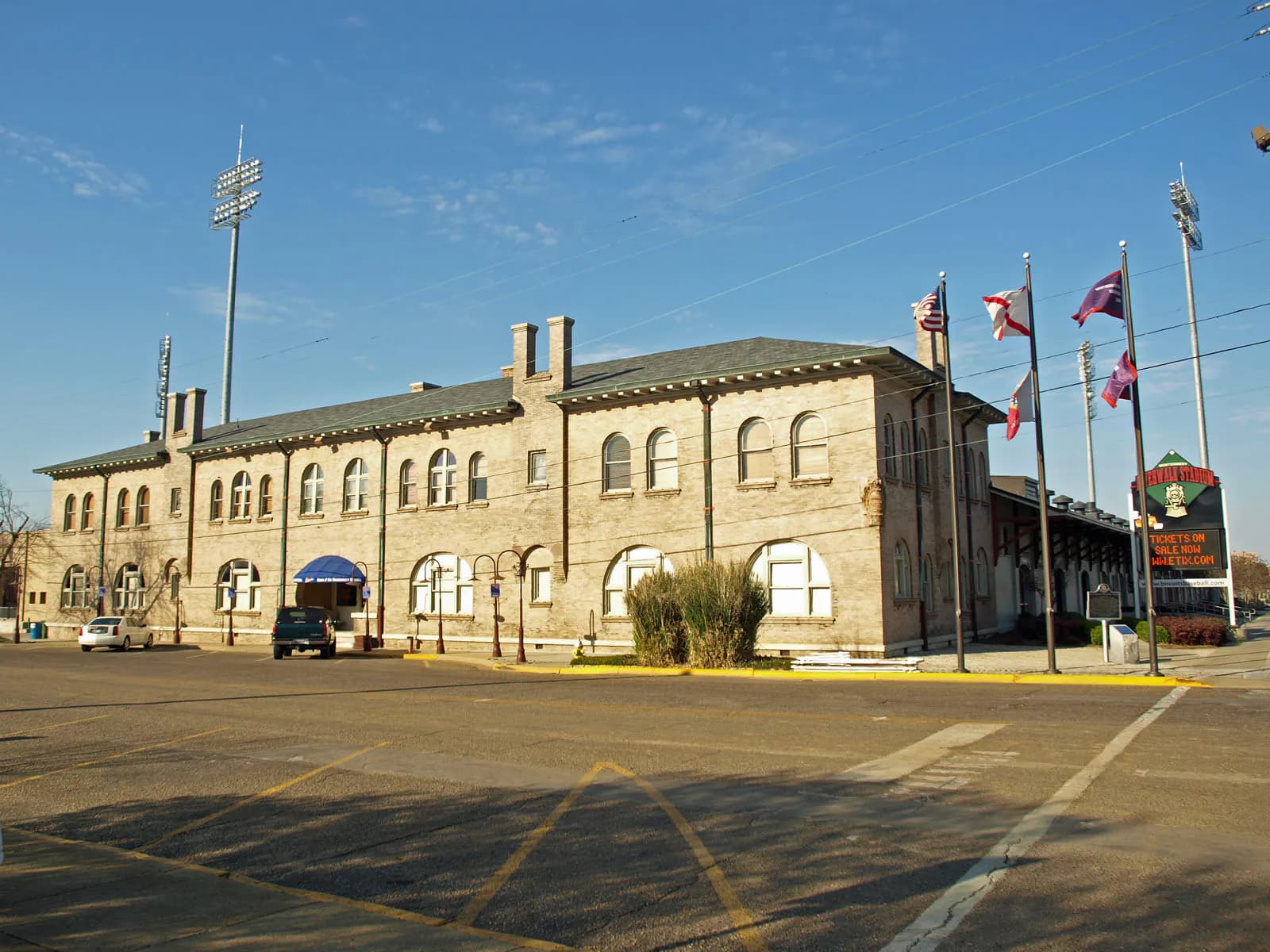 Full historic warehouse exterior and entrance of DABOS Park in Montgomery