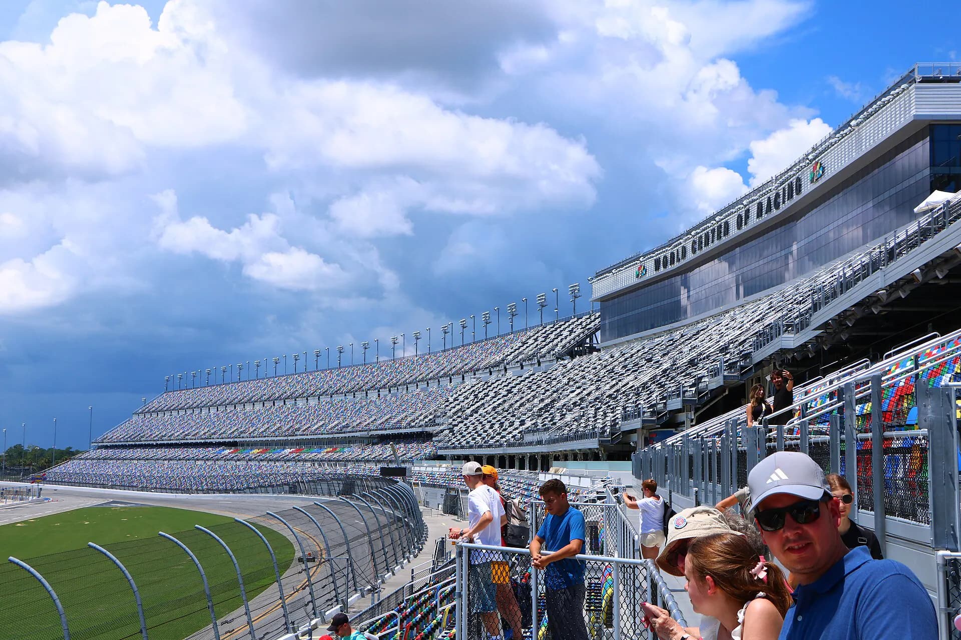 Wide exterior view of Daytona International Speedway and its main grandstand facade.