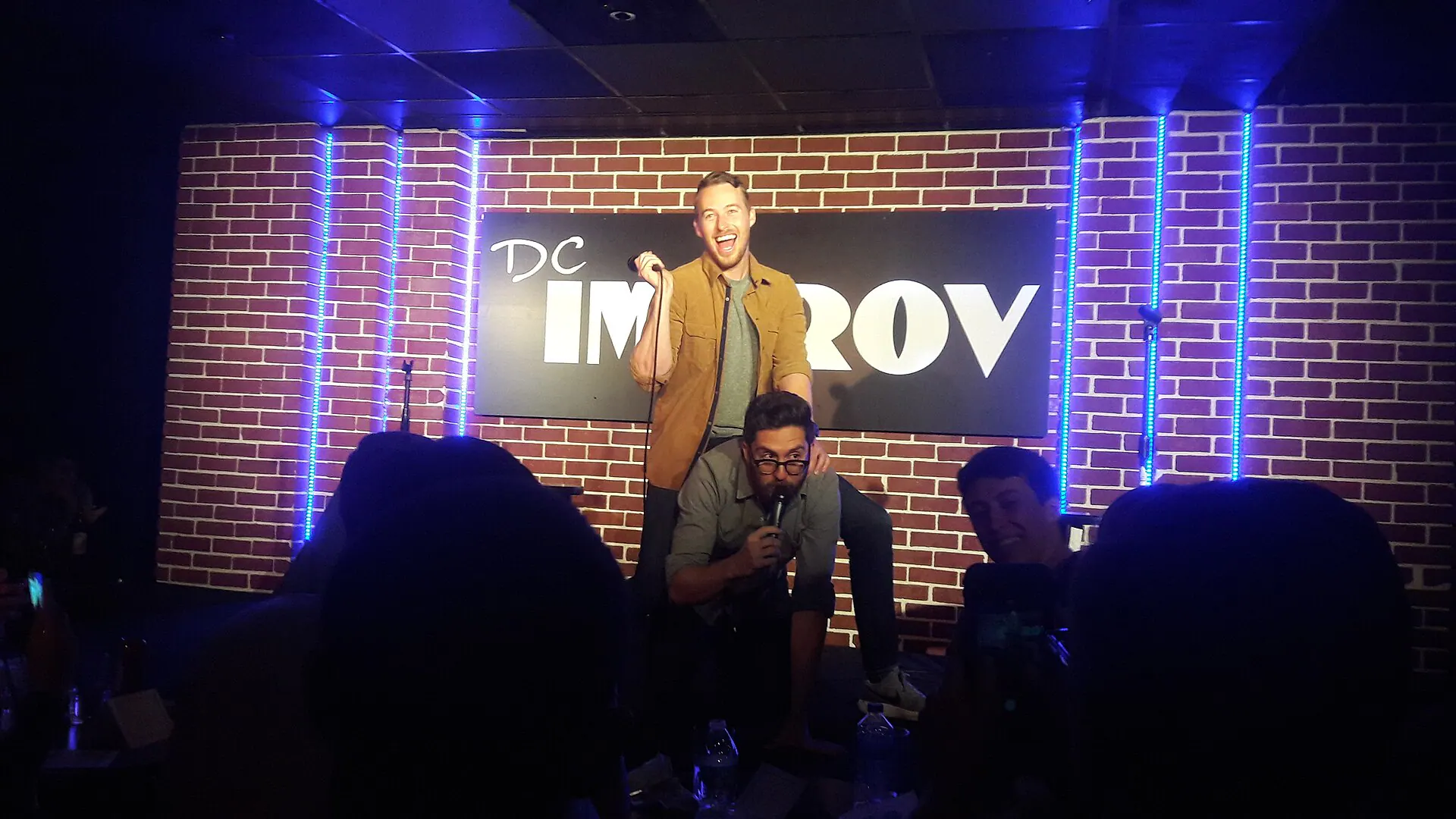 Audience view of the stage during a live show inside DC Improv.