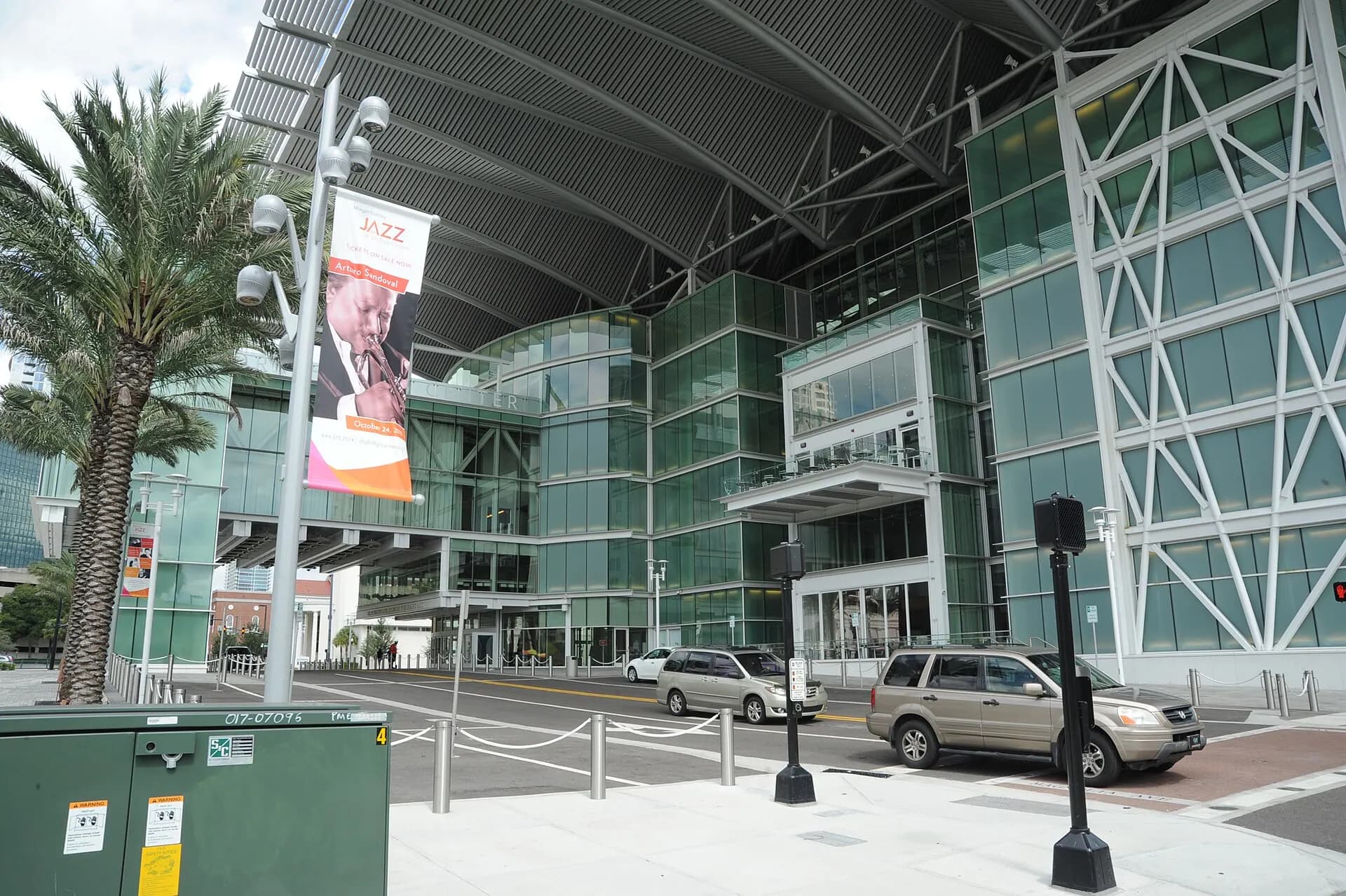 The glass-fronted entrance of the Dr. Phillips Center for the Performing Arts.