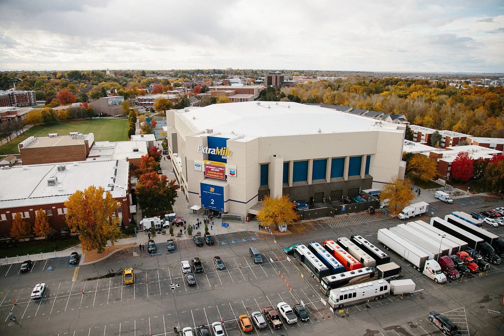 An aerial exterior view of ExtraMile Arena and its signed facade on the Boise State campus.
