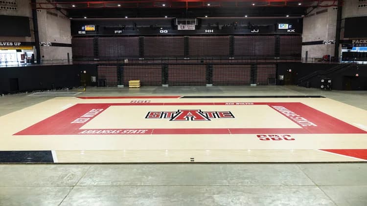 First National Bank Arena’s new volleyball playing surface and surrounding stands in an official August 2026 photograph. Basketball and concerts use different floor layouts.