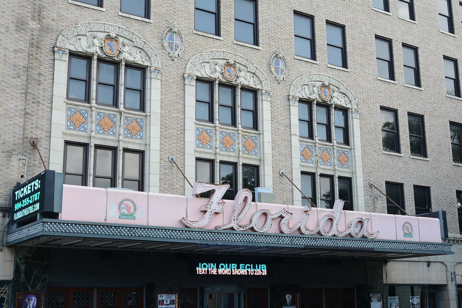 Wide exterior view of the Florida Theatre facade and marquee in downtown Jacksonville.