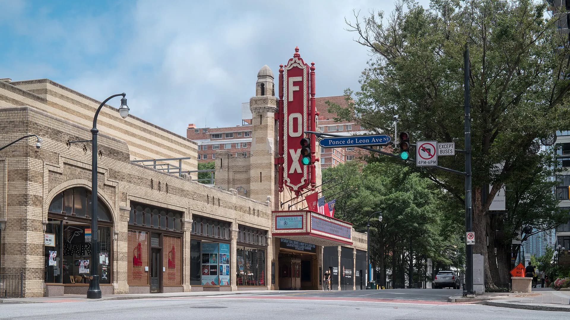 Fox Theatre sign, marquee, and Peachtree Street exterior in Atlanta.