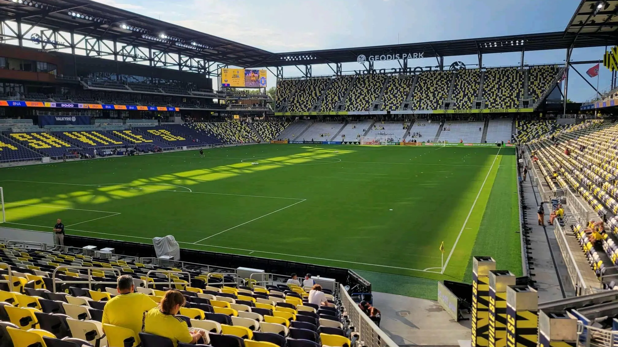 Wide view across the pitch and full seating bowl inside GEODIS Park.