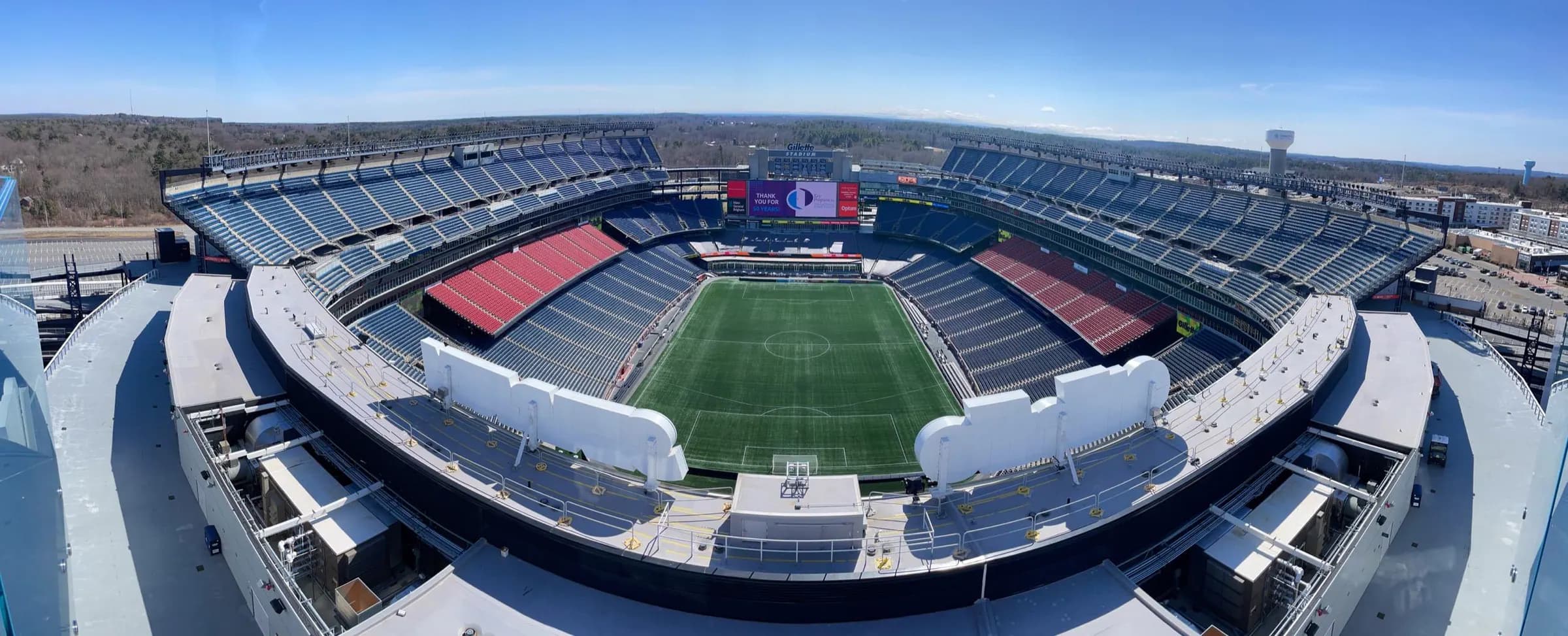 Super-wide view across the full seating bowl and field at Gillette Stadium.