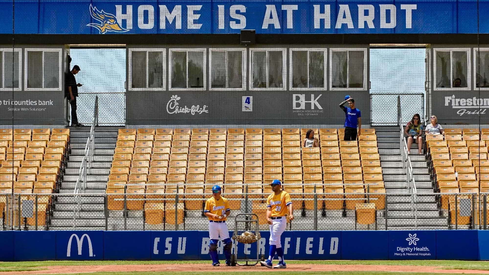 Hardt Field’s actual chairback grandstand, press box and occupied field-side seating in CSUB’s 2024 season-renewal page. This earlier-season image supplies no exact capture date or numbered spectator camera seat; the page’s old prices and parking offers are separate from current event terms.
