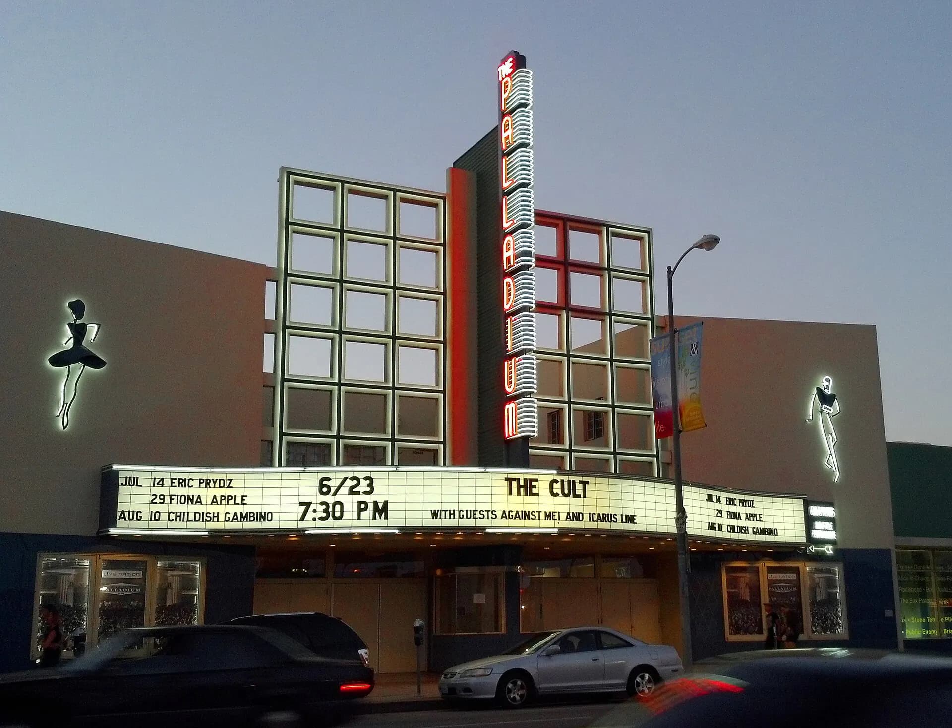 Wide exterior view of the Hollywood Palladium and its marquee on Sunset Boulevard.