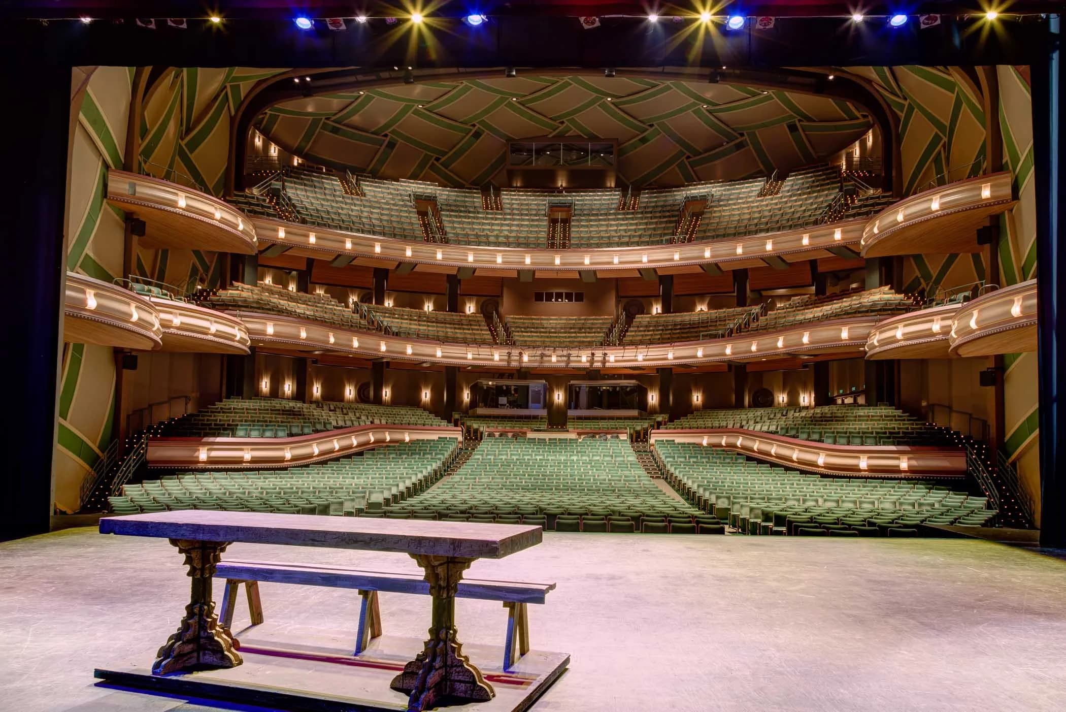 Silva Concert Hall at the Hult Center from the stage, showing the green orchestra seats, stacked balconies and side boxes. This official rental-gallery photograph is undated and does not identify a spectator seat.