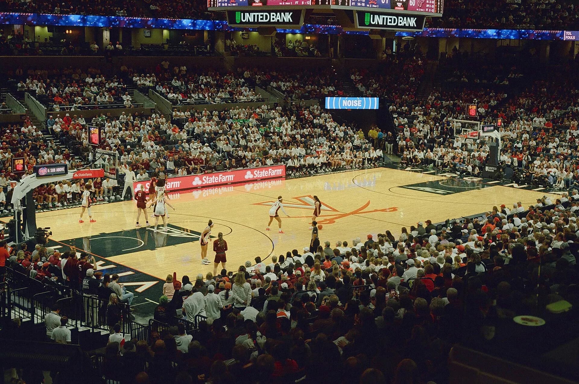 Wide interior view of a Virginia basketball game and seating bowl at John Paul Jones Arena.