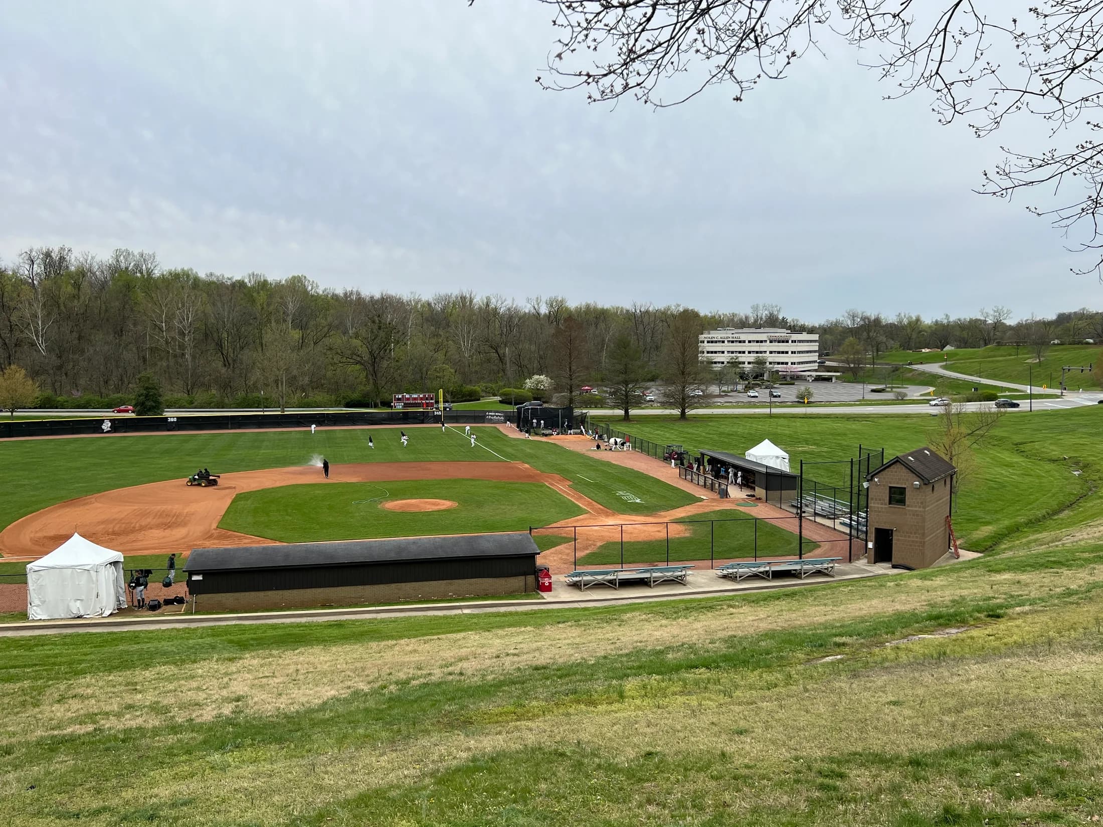 Knights Field’s complete diamond, backstop, bleachers and sloped hillside from above, photographed by Marc Viquez for Stadium Journey’s Bellarmine collection. The review was published in 2023 and updated in 2025; no exact capture day or numbered camera seat is supplied.