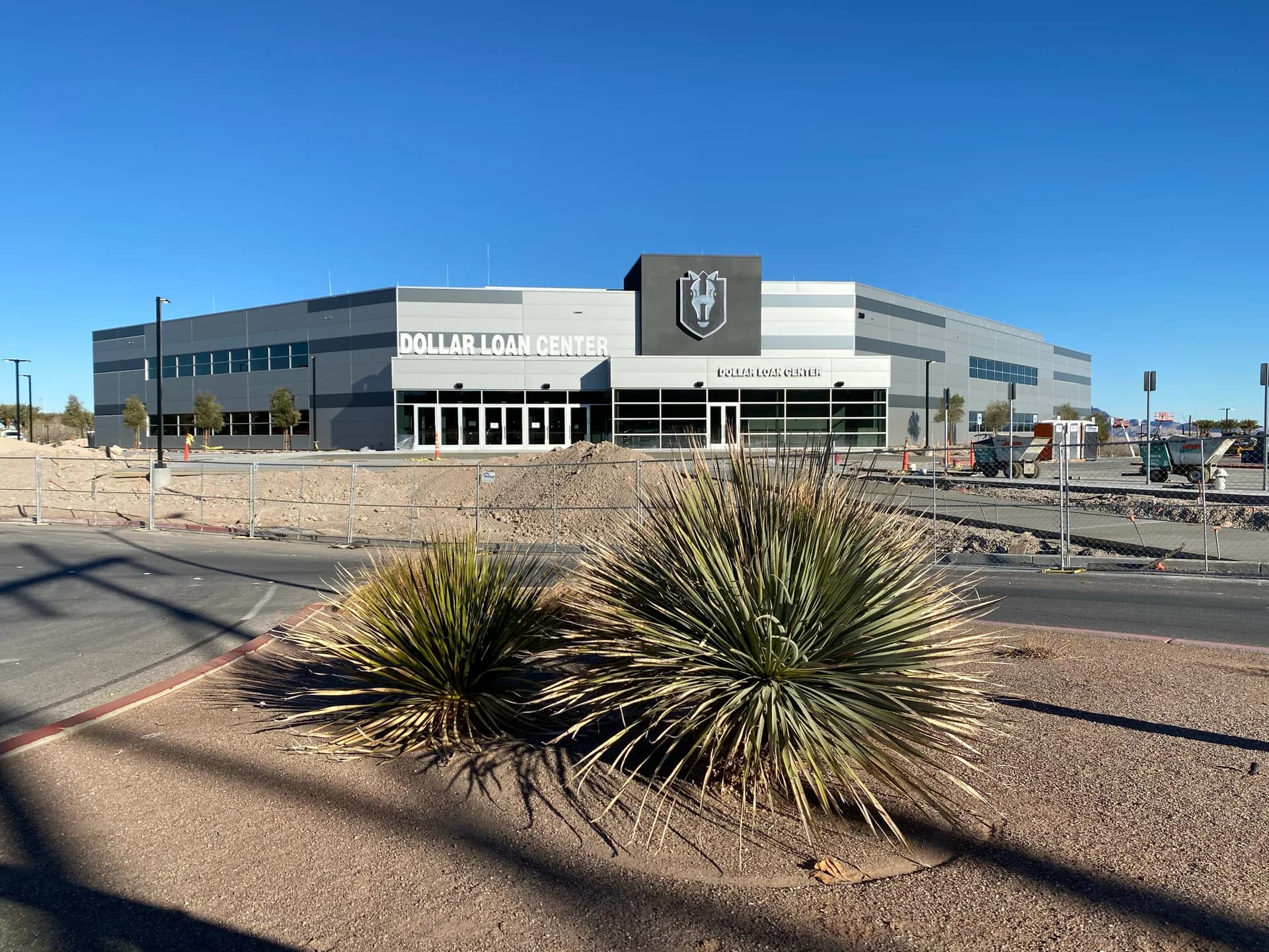 Exterior of Lee’s Family Forum with its former Dollar Loan Center signage.