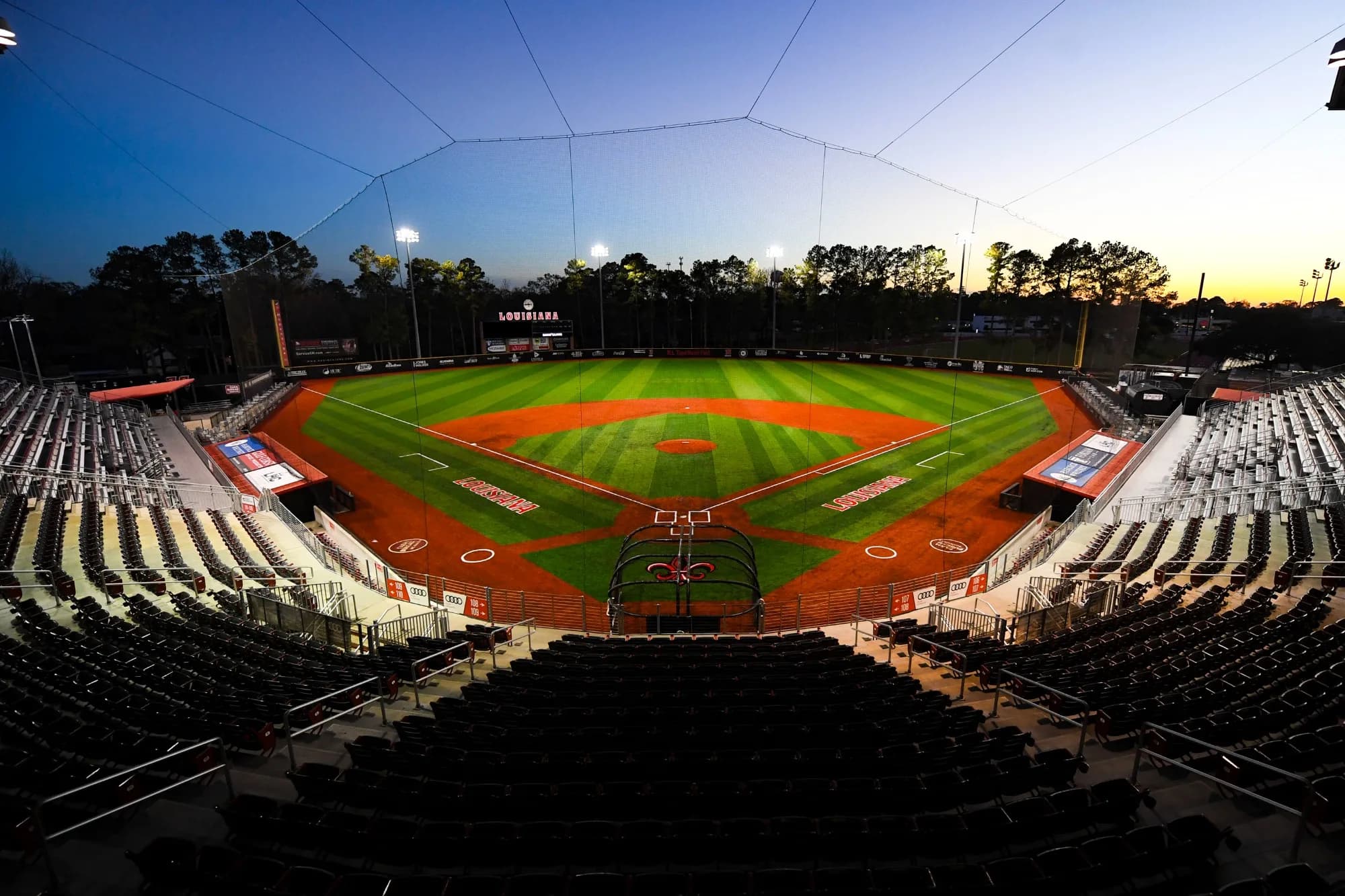 M.L. “Tigue” Moore Field’s diamond, grandstand and protective netting in Benjamin R. Massey’s January 17, 2024 turf-renovation photograph, explicitly dated and credited by Louisiana Athletics. This historical photograph predates the Tony Robichaux Park rename and supplies no numbered camera seat.