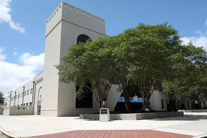 McAlister Field House’s entrance building and exterior approach in an older official facility photograph published in April 2020.