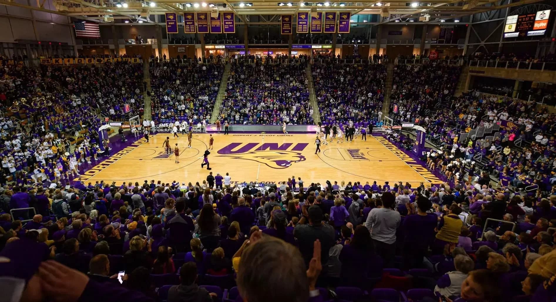 McLeod Center’s basketball floor and surrounding occupied seating bowl, shown in the owner’s current facility gallery. This photograph is undated and does not identify a numbered ticket seat; court-side inventory and team-bench locations depend on the game.