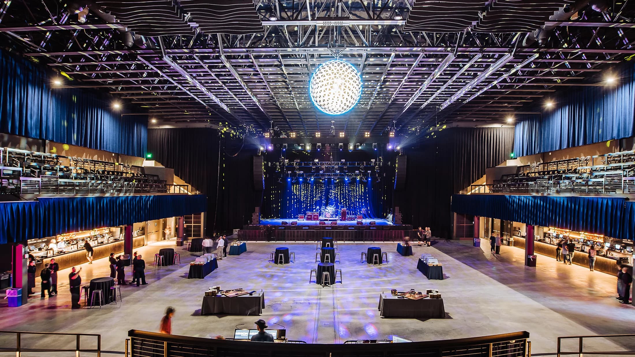Mission Ballroom’s main room in an owner-published private-event setup; floor furniture and stage position vary by show.