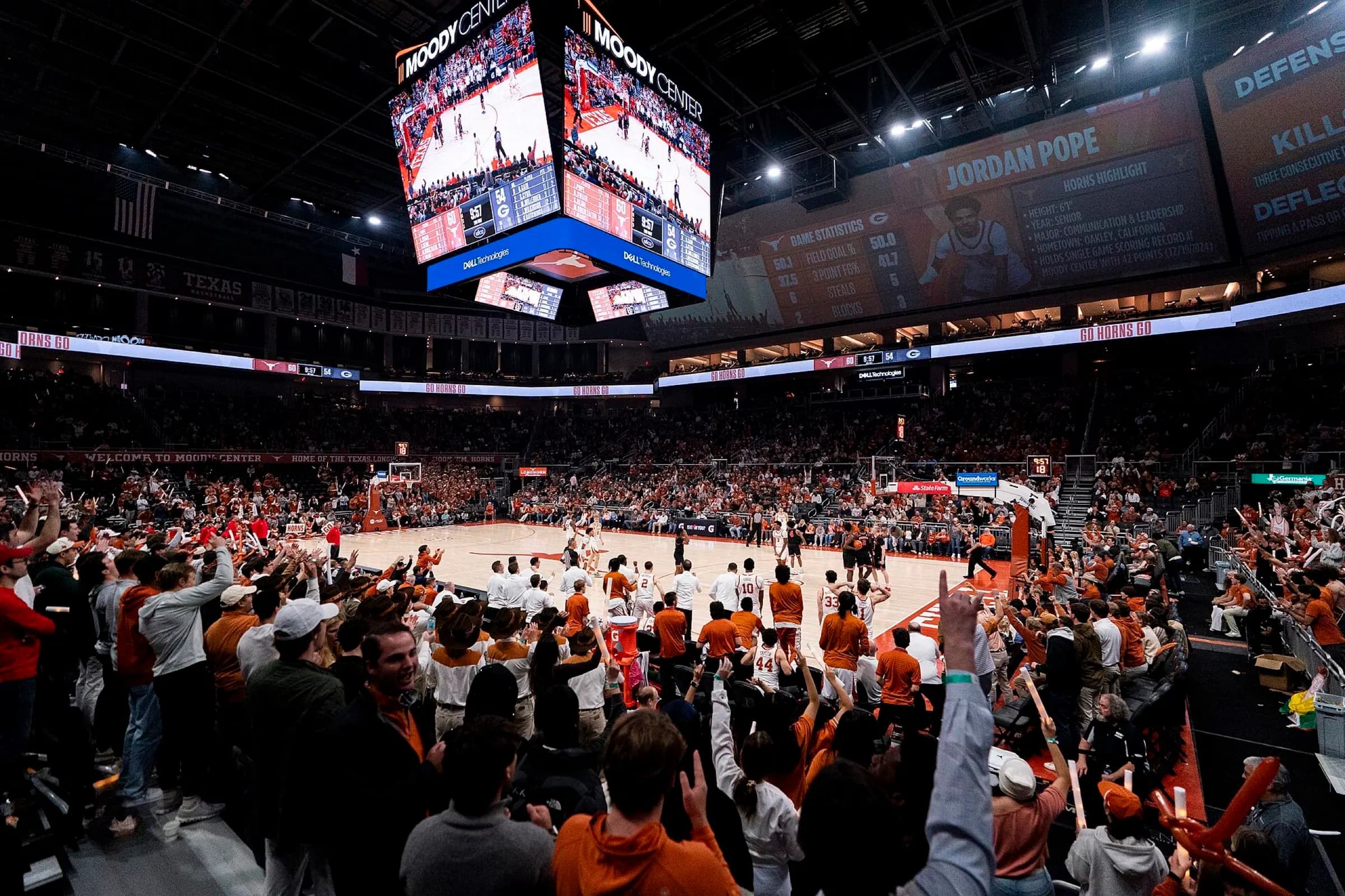 Fans at a Texas-Georgia basketball game inside Moody Center.