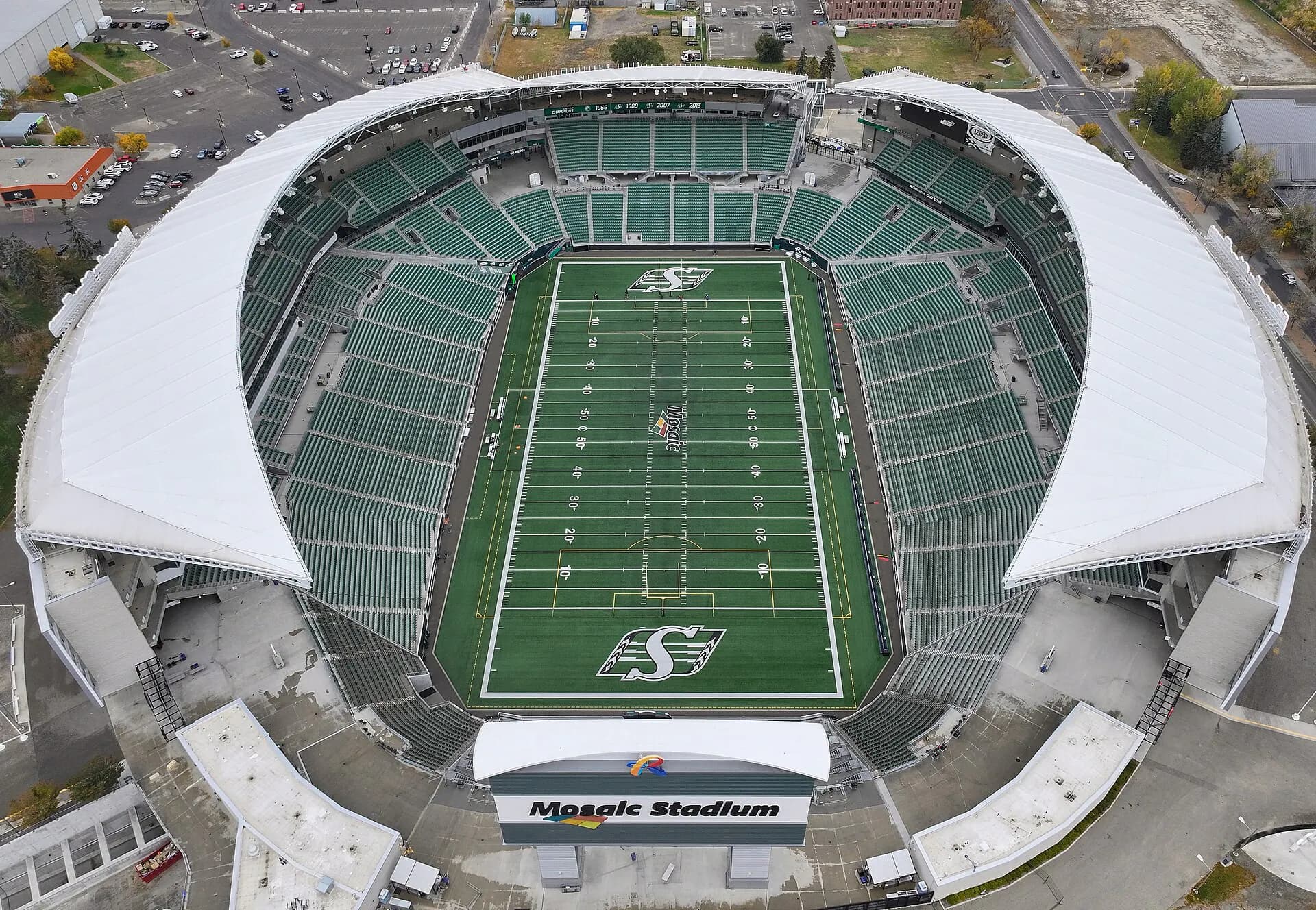Aerial establishing view of Mosaic Stadium's field and seating in Regina