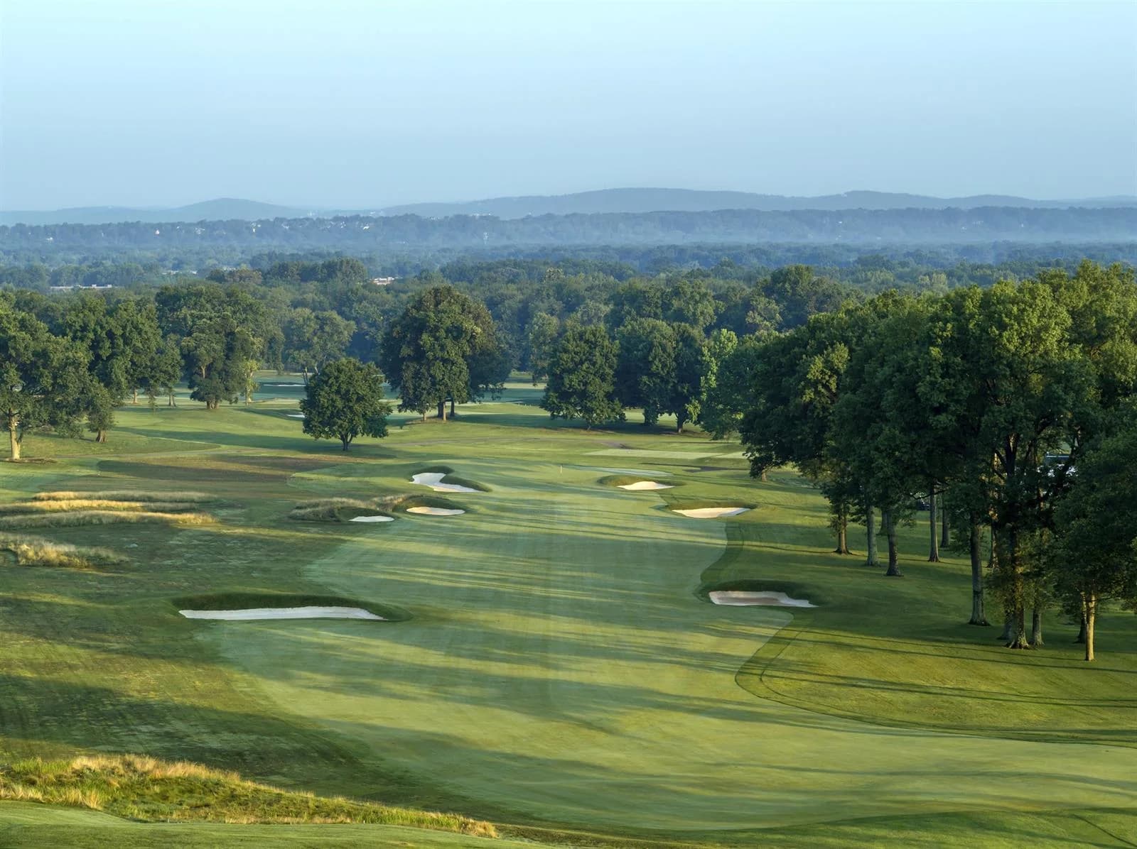 Mountain Ridge Country Club — first-hole fairway and green from the owner’s numbered photo tour. The photograph has no supplied capture date; accompanying Donald Ross field sketches are historical drawings.