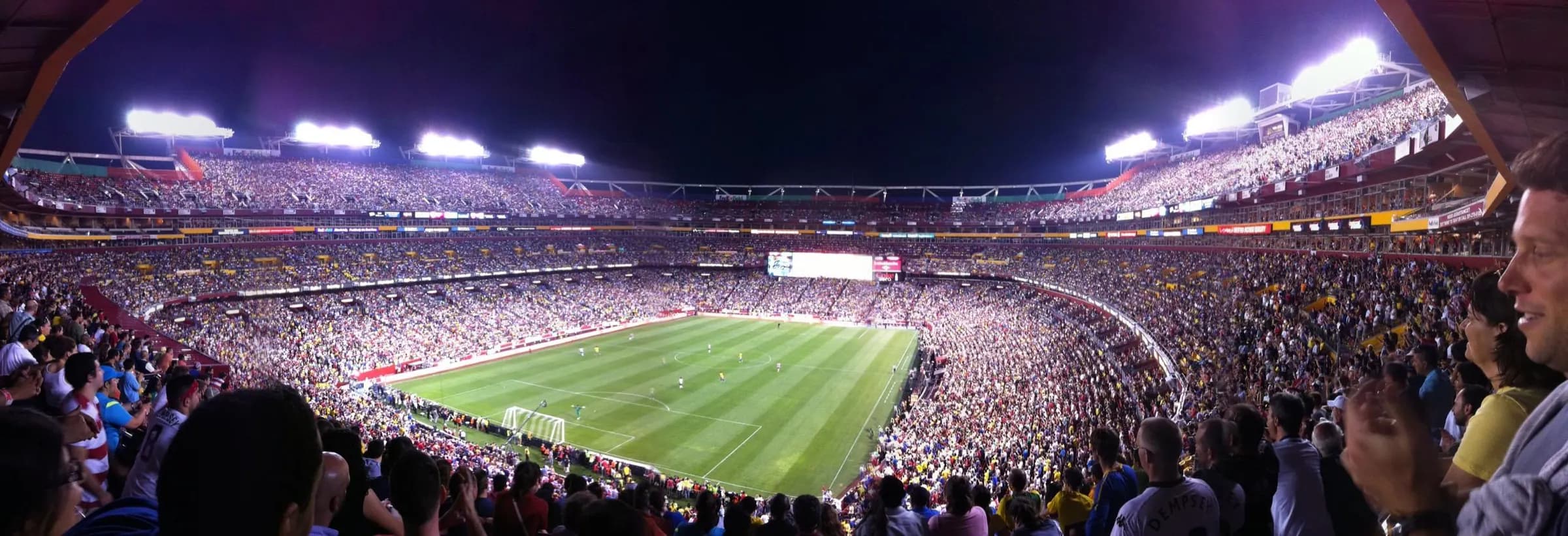 Packed panoramic view across the field and seating bowl at Northwest Stadium.
