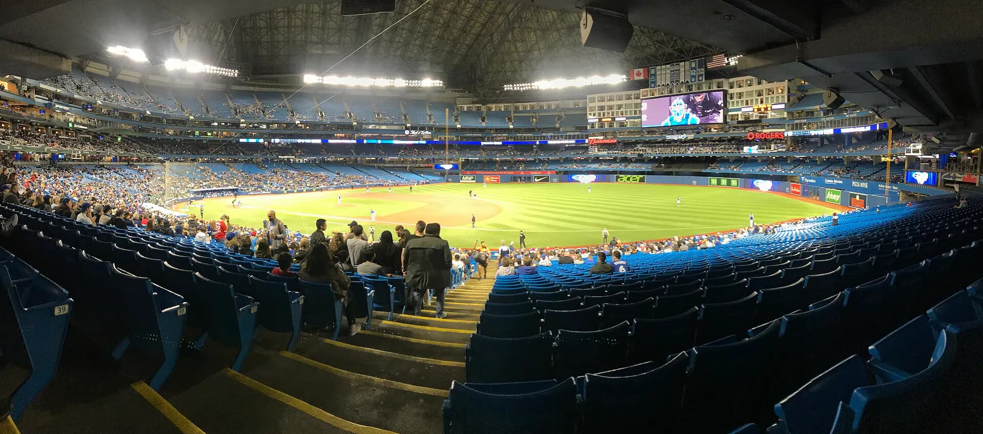 Wide interior view of the Rogers Centre seating bowl and baseball field in Toronto