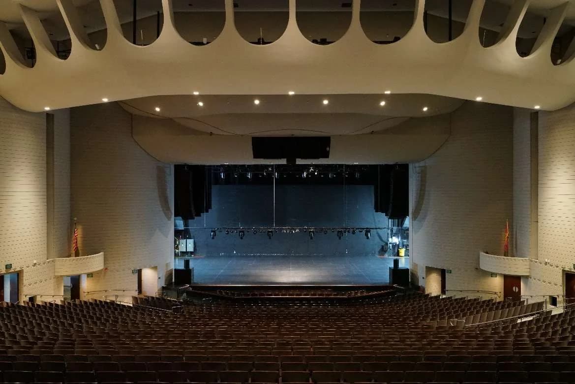 Ruth Eckerd Hall’s empty auditorium and stage from page one of its June 2025 technical specifications. The document date does not establish when the photograph was taken; production equipment can change.