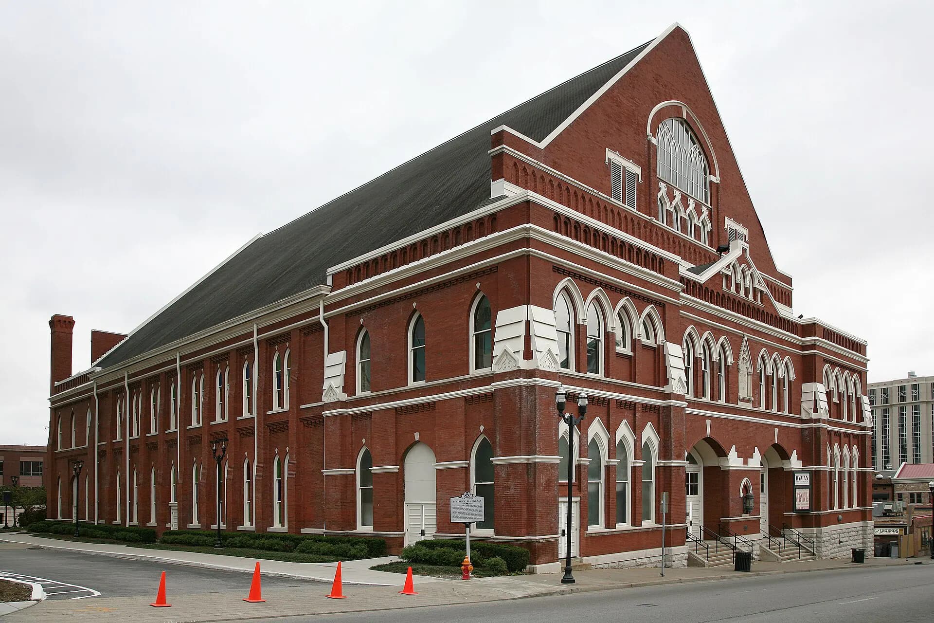Brick side exterior and gabled roof of Ryman Auditorium in Nashville.