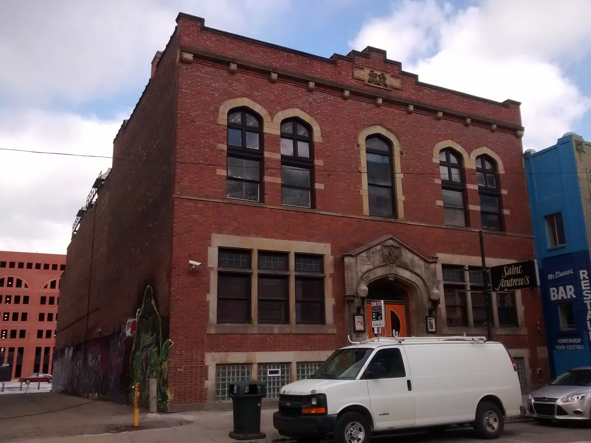 Exterior establishing view of Saint Andrew's Hall and its entrance in Detroit.
