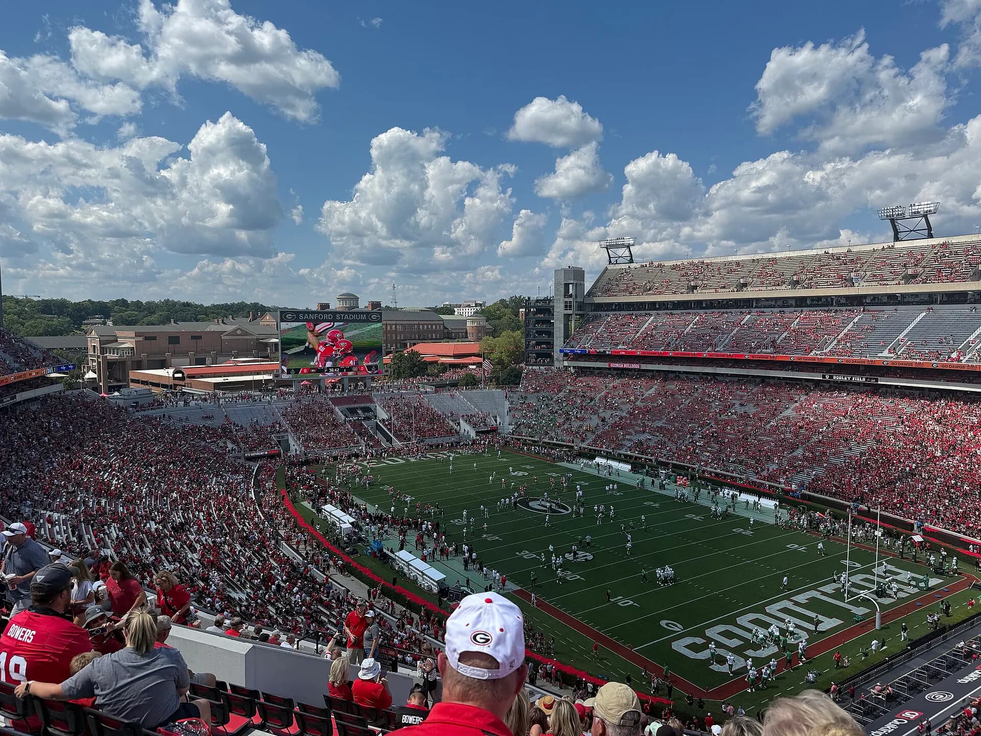 Wide 2025 game-day view across the field and seating bowl at Sanford Stadium.