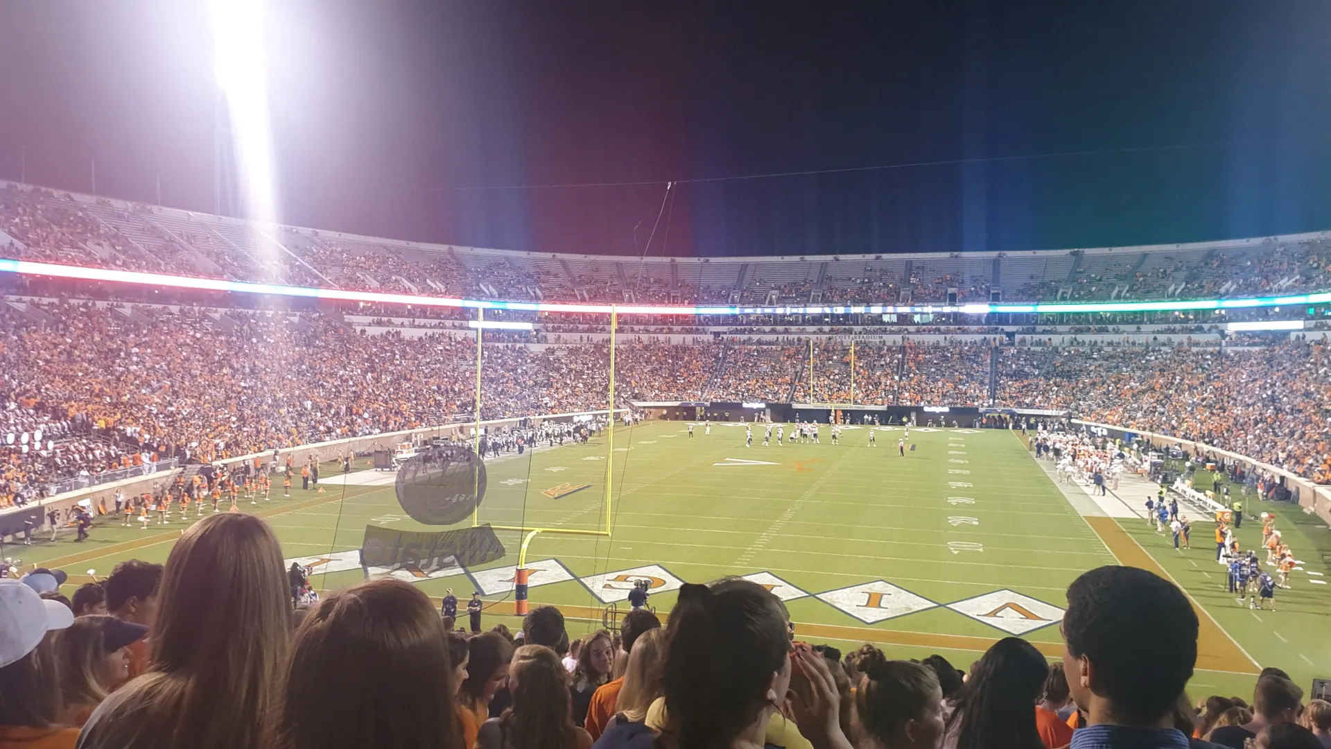 Full-bowl game-day view across Scott Stadium's football field and surrounding seating.