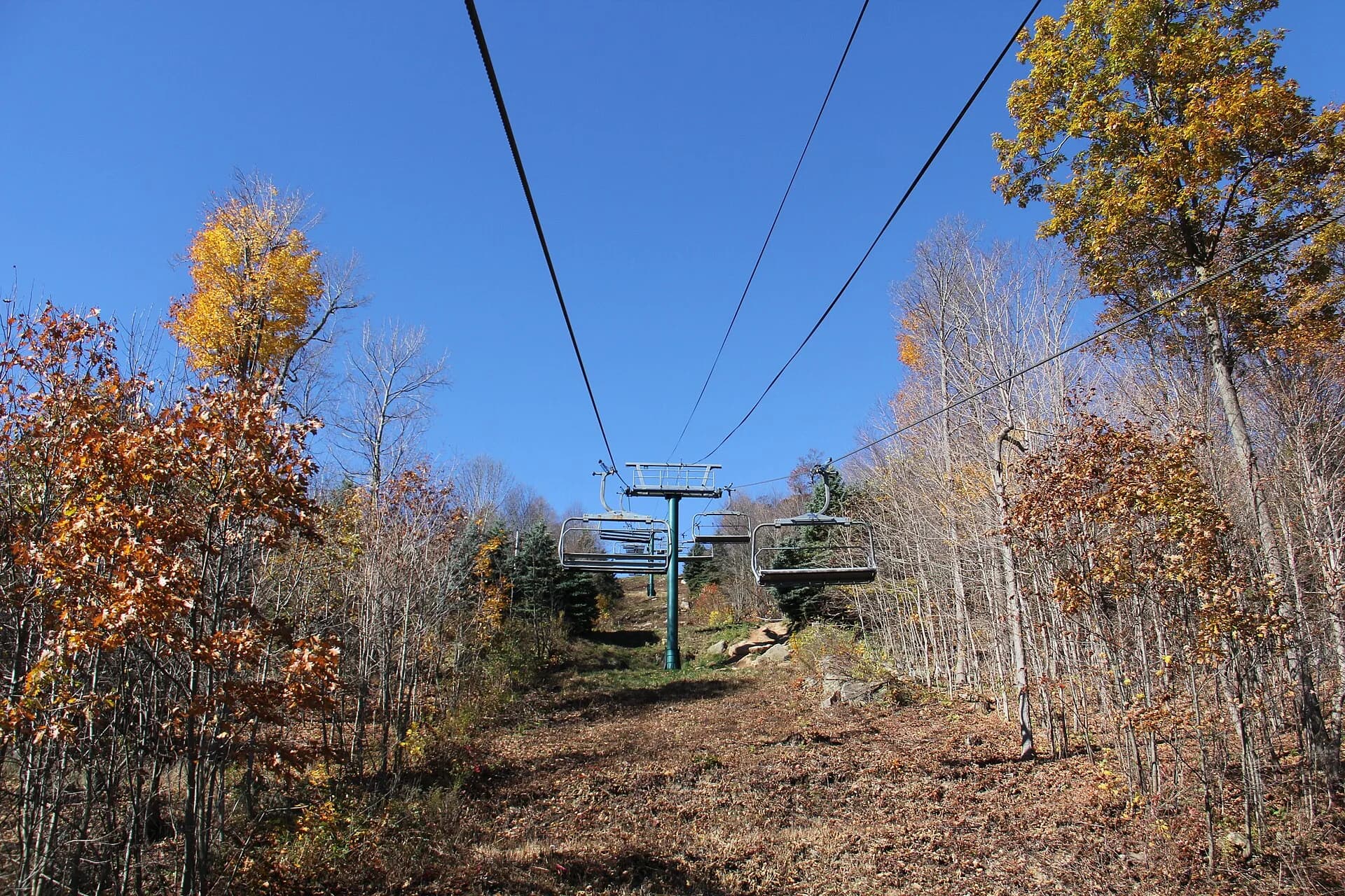 Off-season chairlift and slopes at Seven Springs Mountain Resort.