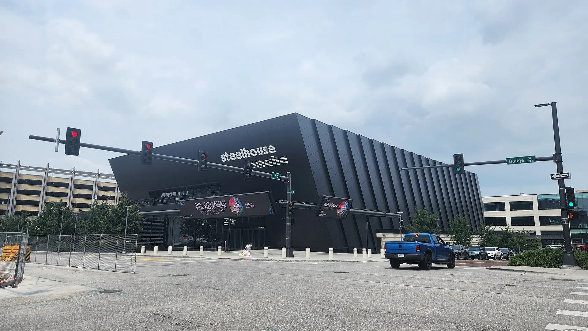 Wide exterior view of the modern Steelhouse Omaha facade and entrance.
