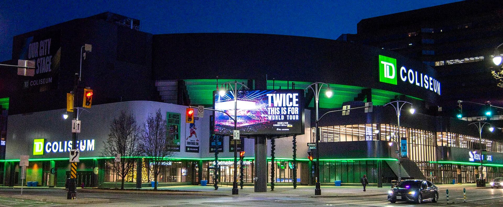 Current nighttime exterior and main entrance of TD Coliseum in Hamilton